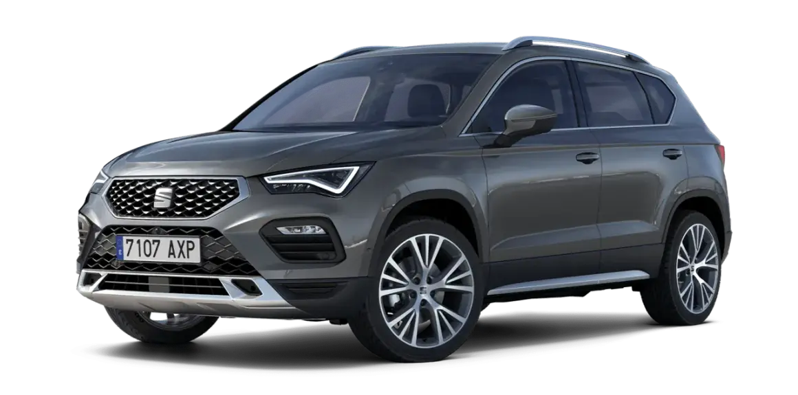 Szary Seat Ateca z widocznymi felgami i tablicą rejestracyjną. Sprawdź seat ateca wymiary, by poznać jego gabaryty.